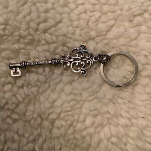 Elegant Silver Key-Shaped Keychain